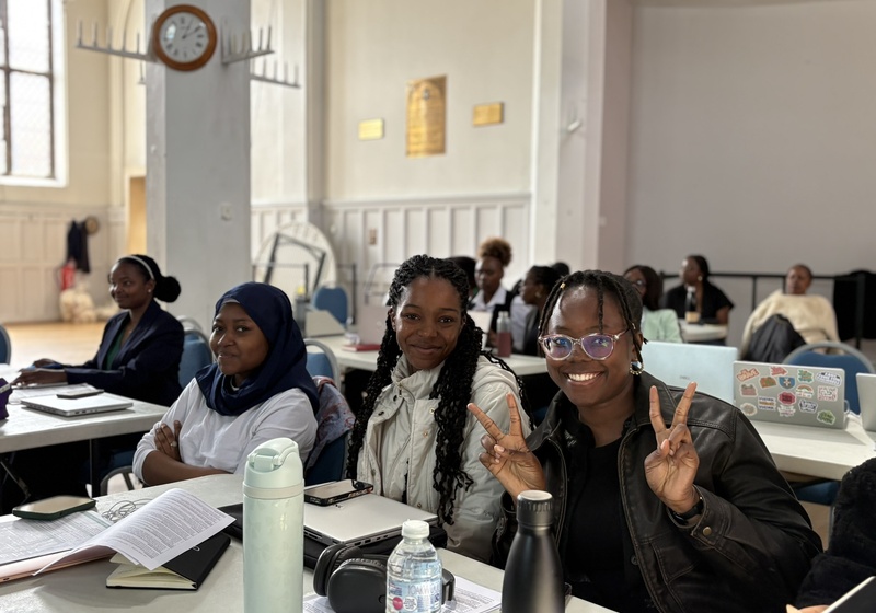 Three African students participating in a seminar